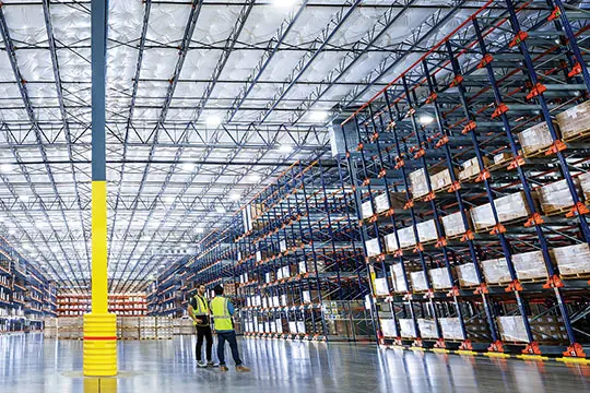 Workers in SuperHub warehouse