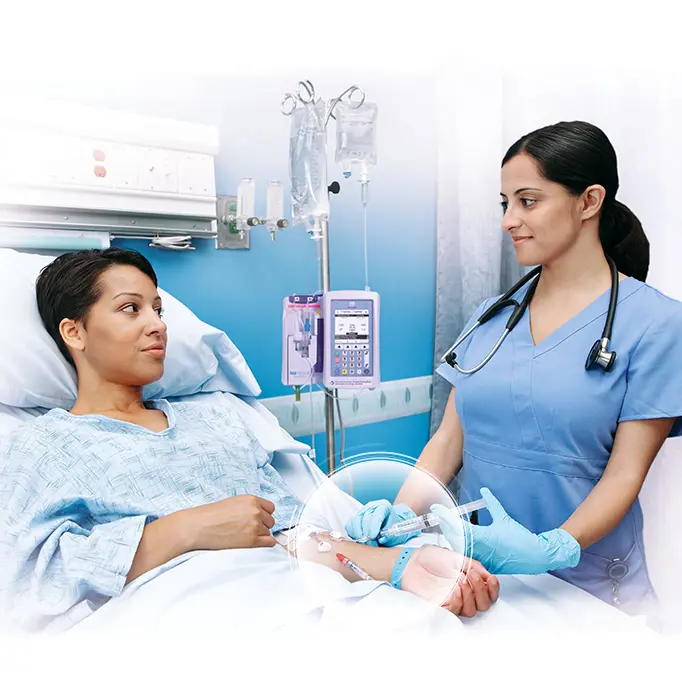 ICU Medicals Neutron being used by a Nurse